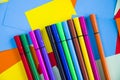 Sketch markers on the colorful paper background, paper board and empty space for text