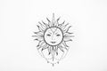 Sketch of the sun with a smile on white background. Royalty Free Stock Photo