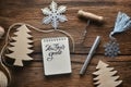 Sketchbook on wooden table in new years theme Royalty Free Stock Photo