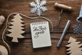 Sketchbook on wooden table in new years theme Royalty Free Stock Photo