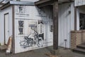 Some black-and-white sketches on the wall of the Highwayman saloon in Union Bay, BC