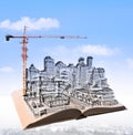 sketching of building construction on flying book over urban scene use for civil engineering and land development topic Royalty Free Stock Photo