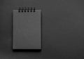 A sketchpad with black pages