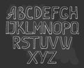 Sketchy alphabet on black background.