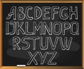 Sketchy alphabet on blackboard background.