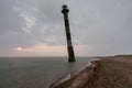 Skew lighthouse in the Baltic Sea. Stormy night on the beach. Kiipsaar, Harilaid, Saaremaa, Estonia, Europe.