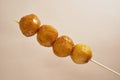 A skewer of Hong Kong-styled curry fish balls