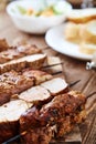 Skewered meat or shish kebabs of pork in marinade Royalty Free Stock Photo