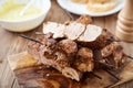 Skewered meat or shish kebabs of pork in marinade Royalty Free Stock Photo