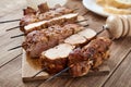 Skewered meat or shish kebabs of pork in marinade Royalty Free Stock Photo
