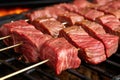 skewering slices of porterhouse steak for kabobs