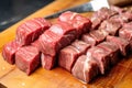 skewering slices of porterhouse steak for kabobs