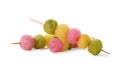 Skewers with color cotton balls isolated on white. Sweet candy Royalty Free Stock Photo