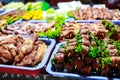 Skewers fried meat on a grill