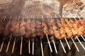 skewers with meat on a barbeque Royalty Free Stock Photo