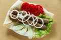 Skewers minced meat grilled kebab with pita bread and vegetables Royalty Free Stock Photo