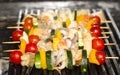 Skewers of seafood grilling Royalty Free Stock Photo