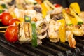 Skewers of seafood grilling Royalty Free Stock Photo