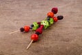 Skewers of vegetables and berries Royalty Free Stock Photo