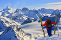 Ski with amazing view of swiss famous mountains in beautiful winter snow Mt Fort. The skituring, backcountry skiing in fresh
