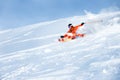 Ski athlete in a fresh snow powder rushes down the snow slope Royalty Free Stock Photo