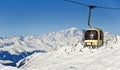 Ski cable car, snowy Alps mountains and the Mont-Blanc