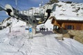 Ski chair-lift arrival in mountain Royalty Free Stock Photo