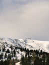 Ski chair lift going up a mountain peak at Turracher Hohe Royalty Free Stock Photo