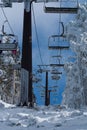 Ski chair lift with skiers. Ski resort in , navacerrada,spain