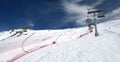 Ski chairlift on mountainside Royalty Free Stock Photo