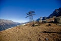 Ski elevators in snowly mountains in Swiss near Geneva, blue sky, Eurone nature, stones and fresh air Royalty Free Stock Photo