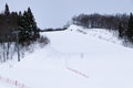 Ski field large white snow on slopes. Ski slopes snow. Winter banner panorama of slope at ski resort, Royalty Free Stock Photo