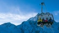 Ski holiday - family of skiers on chairlift