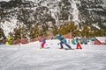 Ski instructor teaching a group of young kids how to ski in El Tarter, Andorra Royalty Free Stock Photo