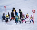 Ski instructor in penguin suit studies children. Ski resort in Alps, Austria, Zams on 22 Feb 2015