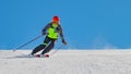 A ski instructor while skiing alone in a ski resort