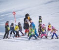 Ski instructors study young skiers in children ski school. Ski r