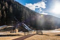 Ski jump ramp in water and snow. Pellizzano, Ski region Val di Sole, Trento, Trentino, Italy