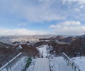 Ski jump stadium are covered with snow from top view in winter Royalty Free Stock Photo
