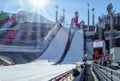 Ski jumping at the 2014 Winter Olympics was held at the RusSki Gorki Jumping Center, Krasnaya Polyana. Scenic front view of ski ju Royalty Free Stock Photo