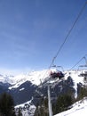 Ski lift carries holiday skiers up the mountain