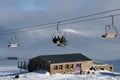 Ski lift carrying skiers