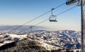 Ski lift with chairs in Kopaonik resort in Serbia Royalty Free Stock Photo