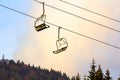 Ski lift with empty seats in ski resort Royalty Free Stock Photo