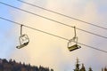 Ski lift with empty seats in ski resort Royalty Free Stock Photo