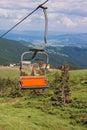 Ski lift mast in a summer mountain landscape. Carpathian mountains, Ukraine, Europe. Discover the beauty of earth Royalty Free Stock Photo