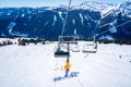 Ski lift in the mountainous ski resort in the Alps