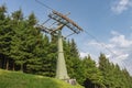 Ski lift pylon, chairlift in Jesenik mountains in summer day Royalty Free Stock Photo