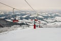 Ski lift ski resort. Winter fun. Family holidays and travel in the mountains. Nature forest landscape Royalty Free Stock Photo