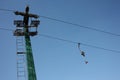 Ski lift or skilift. cable car pole on snow slope in summer